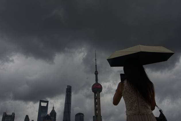 Shanghai Braces For Typhoon Dolphin General view of tourists taking selfies at North Bund in Shanghai, China, as Typhoon Dolphin approaches the country. shanghai China  Copyright: xYingxTangx originalFilename: tang-shanghai260808_npzN3.jpg