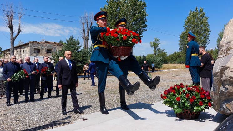 SOUTH OSSETIA, TSKHINVAL - AUGUST 8, 2026: Russia s Ambassador to South Ossetia Marat Kulakhmetov (L midground) takes part in a flower laying ceremony at Russian peacekeepers barracks that was attacked during Georgia s aggression against South Ossetia in 2008. Alyona Tedeyeva TASS  95914668