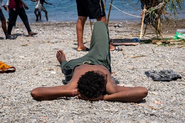 August 8, 2026, Ceuta, Spain: CEUTA, Spain Ã¢â‚¬ August 8, 2026: Migrants who entered the Spanish North African enclave of Ceuta following the mass arrival on July 30 continue to sleep in makeshift camps across the city. Humanitarian organisations distribute food and essential supplies at the two main gathering points where many migrants are staying, while local residents provide shelter to others, including unaccompanied girls and families. Ceuta Spain - ZUMAq101 20260808_zna_q101_188 Copyright: xAntonioxSemperex