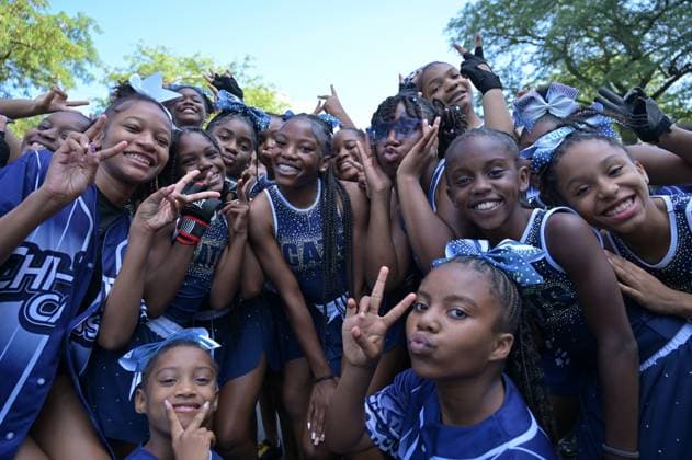 Chicago hosts 97th annual Bud Billiken Parade CHICAGO, ILLINOIS - AUGUST 08: Members of the Chi-Town Cats cheer team pose for a photo as they march down Dr. Martin Luther King Jr. Drive during the 97th annual Bud Billiken Parade in the Bronzeville neighborhood on August 08, 2026 in Chicago, Illinois. Established in 1929, the historic procession is the largest African American parade in the United States, drawing hundreds of thousands of spectators to celebrate Black youth, culture, and the upcoming back-to-school season. Jacek Boczarski Anadolu Chicago United States. Editorial use only. Please get in touch for any other usage.  Copyright: x2026xAnadoluxJacekxBoczarskix