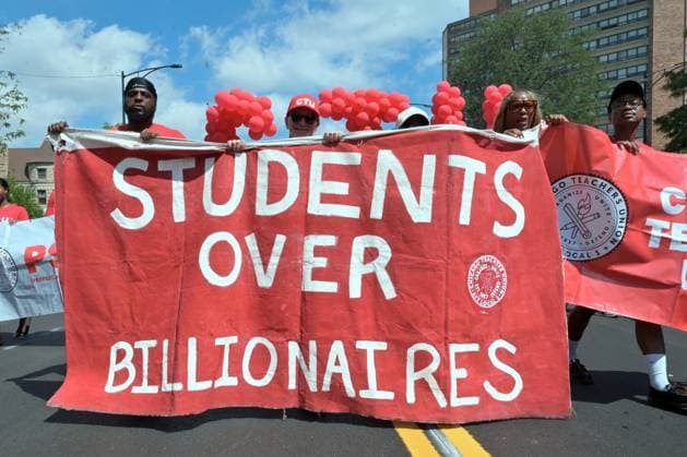 Chicago hosts 97th annual Bud Billiken Parade CHICAGO, ILLINOIS - AUGUST 8: Chicago Teachers Union (CTU) members carry a banner reading Students Over Billionaires as they march down Dr. Martin Luther King Jr. Drive during the 97th annual Bud Billiken Parade in the Bronzeville neighborhood on August 8, 2026. Established in 1929, the historic procession is the largest African American parade in the United States, drawing hundreds of thousands of spectators to celebrate Black youth, culture, and the upcoming back-to-school season. Jacek Boczarski Anadolu Chicago United States. Editorial use only. Please get in touch for any other usage.  Copyright: x2026xAnadoluxJacekxBoczarskix