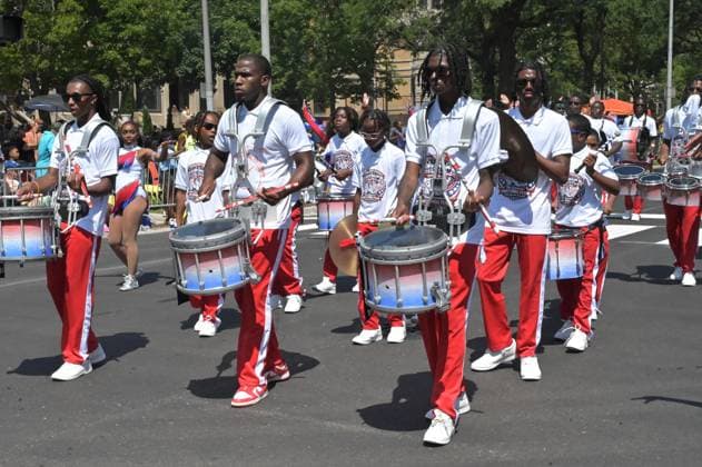 Chicago hosts 97th annual Bud Billiken Parade CHICAGO, ILLINOIS - AUGUST 8: Members of a drumline in matching white shirts and red pants perform along Dr. Martin Luther King Jr. Drive during the 97th annual Bud Billiken Parade in the Bronzeville neighborhood on August 8, 2026 in Chicago, Illinois. Established in 1929, the historic procession is the largest African American parade in the United States, drawing hundreds of thousands of spectators to celebrate Black youth, culture, and the upcoming back-to-school season. Jacek Boczarski Anadolu Chicago United States. Editorial use only. Please get in touch for any other usage.  Copyright: x2026xAnadoluxJacekxBoczarskix
