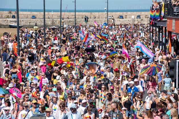 August 8, 2026, Margate, United Kingdom: Crowds of people march with placards and flags during a parade on the Margate Pride. Gays, trans and non-binary people gathered in Margate, UK to celebrate the 10th Margate Pride. The crowd paraded from the East side of the town to the town centre. Margate United Kingdom - ZUMAs197 20260808_aaa_s197_133 Copyright: xKrisztianxElekx