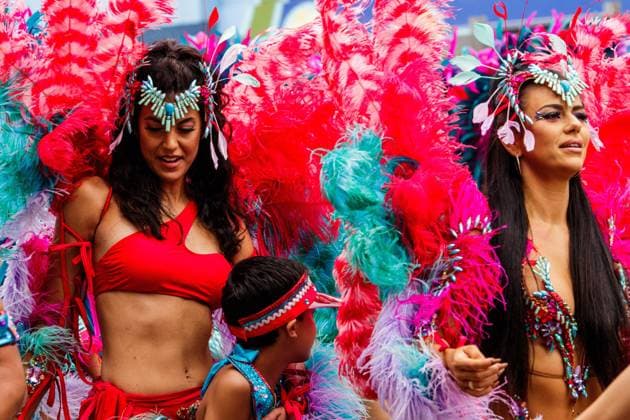 August 8, 2026, Edmonton, Alberta, Canada: Bright colors of the Mas Bands were represented in downtown Edmonton during the Cariwest Parade on day 2 of the Cariwest Festival..Western Canada s largest Caribbean Festival, Cariwest, held its annual parade as part of its 42nd year of festivities. The Parade Mas Bands represent the various Caribbean various Islands and are dressed in brightly colored costumes, some of which can weigh up to 200 lbs, requiring wheels to support the weight. Edmonton Canada - ZUMAs197 20260808_aaa_s197_227 Copyright: xRonxPalmerx