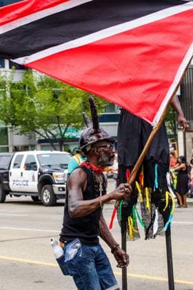 August 8, 2026, Edmonton, Alberta, Canada: A member of the Jab Havoc Mas Band dances through downtown Edmonton during the Cariwest Parade on day 2 of the Cariwest Festival..Western Canada s largest Caribbean Festival, Cariwest, held its annual parade as part of its 42nd year of festivities. The Parade Mas Bands represent the various Caribbean various Islands and are dressed in brightly colored costumes, some of which can weigh up to 200 lbs, requiring wheels to support the weight. Edmonton Canada - ZUMAs197 20260808_aaa_s197_228 Copyright: xRonxPalmerx