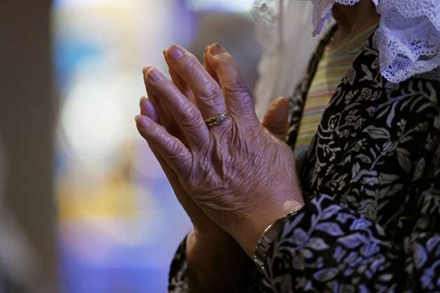 81st A-bomb anniversary in Nagasaki A woman prays during Mass at Urakami Cathedral in Nagasaki on Aug. 9, 2026, the 81st anniversary of the U.S. atomic bombing of the southwestern Japan city.  A14AA0005625363P