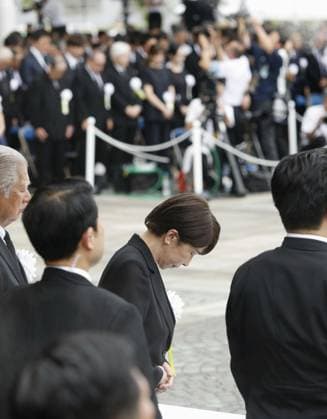 81st A-bomb anniversary in Nagasaki Japanese Prime Minister Sanae Takaichi (2nd from R) observes a moment of silence during a memorial ceremony at Peace Park in Nagasaki at 11:02 a.m. on Aug. 9, 2026, the exact time when a U.S. atomic bomb was dropped on the southwestern Japan city 81 years earlier in World War II.  A14AA0005625390P