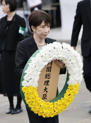81st A-bomb anniversary in Nagasaki Japanese Prime Minister Sanae Takaichi prepares to place a wreath during a memorial ceremony held at Peace Park in Nagasaki on Aug. 9, 2026, to mark the 81st anniversary of the U.S. atomic bombing of the southwestern Japan city in World War II.  A14AA0005625392P