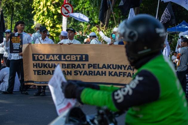 August 9, 2026, Surabaya, Indonesia: SURABAYA, Indonesia Ã¢â‚¬ August 9, 2026: Thousands of demonstrators affiliated with the Alliance of Communities Concerned for the Generation gather on Governor Suryo Street during a rally opposing LGBTQ rights. Participants carried flags and banners expressing opposition to lesbian, gay, bisexual, transgender, and queer (LGBTQ) people and related issues. Surabaya Indonesia - ZUMAq101 20260809_zna_q101_002 Copyright: xMuhammadxIffanxMaulanax
