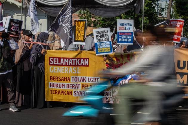 August 9, 2026, Surabaya, Indonesia: SURABAYA, Indonesia Ã¢â‚¬ August 9, 2026: Thousands of demonstrators affiliated with the Alliance of Communities Concerned for the Generation gather on Governor Suryo Street during a rally opposing LGBTQ rights. Participants carried flags and banners expressing opposition to lesbian, gay, bisexual, transgender, and queer (LGBTQ) people and related issues. Surabaya Indonesia - ZUMAq101 20260809_zna_q101_004 Copyright: xMuhammadxIffanxMaulanax