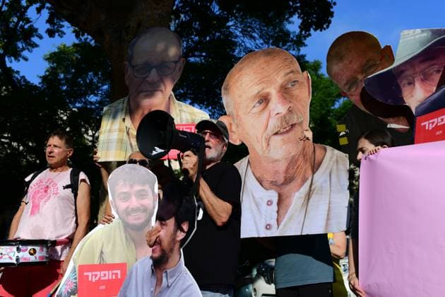 Activists Rally Outside Likud Headquarters in Tel Aviv TEL AVIV, Israel August 9, 2026: Activists demonstrate outside the headquarters of Israel™s ruling Likud party in Tel Aviv, calling for the establishment of a state commission of inquiry to investigate the circumstances and failures surrounding the October 7, 2023 attack. Demonstrators demand an official investigation into the events and the decisions made before and during the attack. Tel-Aviv Israel Copyright: x xTomerxNeubergx xJNAxPressx