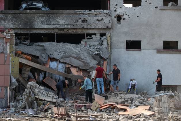 Russia Ukraine Drone Attack 9219347 09.08.2026 People search the rubble after a drone attack in the course of Russia s military operation in Ukraine, in Belgorod, Russia. About 30 apartment buildings, three social and six commercial facilities, and dozens of cars were damaged in an overnight attack by the Ukrainian armed forces. Acting Belgorod Region Governor Alexander Shuvayev said that the city had come under a massive Ukrainian attack, which killed three people and injured 13 others, including two children. The death toll later rose to five. Taisia Liskovets Sputnik Belgorod Russia  Copyright: xTaisiaxLiskovetsx