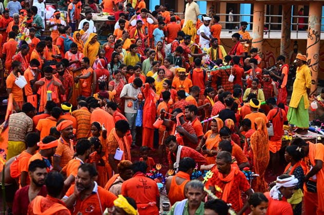 August 9, 2026, Prayagraj, Uttar Pradesh, India: Prayagraj: Kanwariya take a holy dip and collect water of Holy River Ganga during Sawan month, in Prayagraj on Sunday, August 9, 2026. Prayagraj India - ZUMAv115 20260809_zap_v115_032 Copyright: xPrabhatxKumarxVermax
