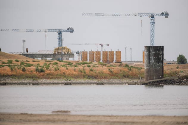 Hungarian nuclear power plant Paks runs on minimum due to water shortage PAKS, HUNGARY - AUGUST 9: The water inlet of the Paks Nuclear Power Plant with minimal water as seen in Paks, Hungary on August 9, 2026. The plant is currently operating with only one of its four reactors at minimum output, an unprecedented situation in its nearly 40-year history, as historically low Danube water levels caused by severe drought have constrained the plant’s cooling capacity. Robert Nemeti Anadolu Paks Hungary. Editorial use only. Please get in touch for any other usage.  Copyright: x2026xAnadoluxRobertxNemetix