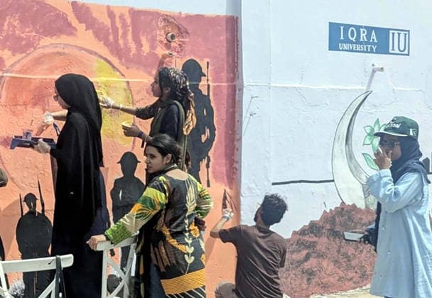 RECORD DATE NOT STATED Fine art students are busy in painting on wall to show their skills during the Rang De event in connection of 79th Independence Day of Pakistan coming ahead under the supervision of District Central Administration, in Karachi on Sunday, August 9, 2026. (S.Imran Ali PPI Images). EDITORIAL USE ONLY Copyright: xx SA-ZM-090826x ppiphotos485109