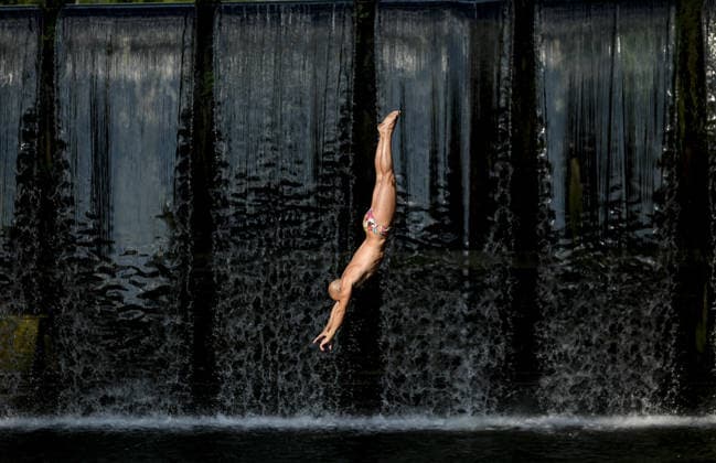 Bentbasa Cliff Diving 2026 in Sarajevo SARAJEVO, BOSNIA AND HERZEGOVINA - AUGUST 9: People jump during the 12th edition of the international Bentbasa Cliff Diving 2026 competition, which is held at Bentbasa, one of the most recognizable locations in Sarajevo, Bosnia and Herzegovina on August 9, 2026. Samir Jordamovic Anadolu Sarajevo Bosnia and Herzegovina. Editorial use only. Please get in touch for any other usage.  Copyright: x2026xAnadoluxSamirxJordamovicx