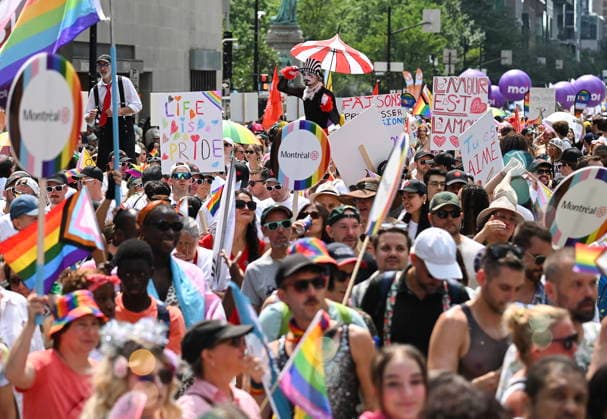August 9, 2026, Montreal, Pq, Canada: Participants carry flags and signs during the Pride parade in Montreal, on Sunday, Aug. 9, 2026. Montreal Canada  - ZUMAc35_ 20260809_zaf_c35_026 Copyright: xGrahamxHughesx