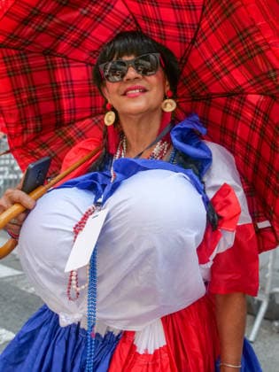 August 9, 2026, New York, New York, USA: Dominican pride on display at the 44th annual Dominican Day Parade on Sixth Avenue..With the theme of Identity and Culture under a blazing sun thousands marched and watched .as merengue, bachata music, colorful floats and traditional dance groups made their way up.the avenue. New York USA  - ZUMAh156 20260809_znp_h156_009 Copyright: xMiloxHessx