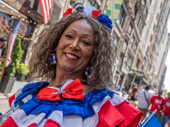 August 9, 2026, New York, New York, USA: Dominican pride on display at the 44th annual Dominican Day Parade on Sixth Avenue..With the theme of Identity and Culture under a blazing sun thousands marched and watched .as merengue, bachata music, colorful floats and traditional dance groups made their way up.the avenue. New York USA  - ZUMAh156 20260809_znp_h156_014 Copyright: xMiloxHessx