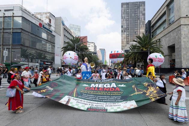 August 9, 2026, Mexico City, Mexico: The Mexico City government held the 17th Mega Calenda 2026, a cultural parade that traveled from the Angel of Independence along Paseo de la Reforma to the citys Zocalo, featuring participants in traditional clothing, dances and music, as part of International Indigenous Peoples Day and the 12th Festival of Indigenous Cultures, Indigenous Peoples and Native Neighborhoods of Mexico City. Mexico City Mexico  - ZUMAl178 20260809_znp_l178_012 Copyright: xCristianxLeyvax