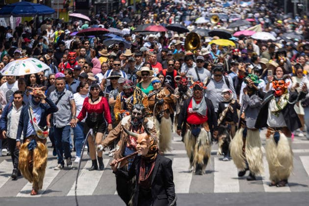 August 9, 2026, Mexico City, Mexico: The Mexico City government held the 17th Mega Calenda 2026, a cultural parade that traveled from the Angel of Independence along Paseo de la Reforma to the citys Zocalo, featuring participants in traditional clothing, dances and music, as part of International Indigenous Peoples Day and the 12th Festival of Indigenous Cultures, Indigenous Peoples and Native Neighborhoods of Mexico City. Mexico City Mexico  - ZUMAl178 20260809_znp_l178_027 Copyright: xCristianxLeyvax