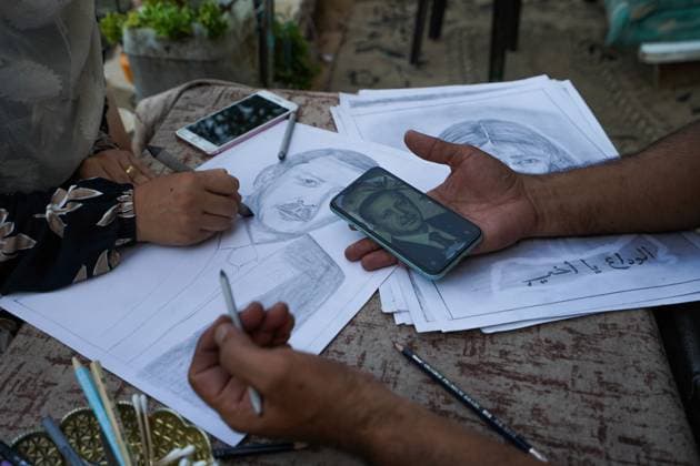 August 9, 2026, Gaza City, Palestine, State of: GAZA Gaza City, GAZA STRIP Ã¢â‚¬ AUGUST 9, 2026: Palestinian artist Nadia Abu Issa creates charcoal drawings depicting the hardships experienced by civilians during the war in Gaza, including shortages of food and water and life under continued displacement and insecurity. Living near an area affected by ongoing military activity, Abu Issa says her artwork aims to document the daily realities faced by Palestinians and preserve their experiences through art. Among her recent works is a portrait of Turkish President Recep Tayyip ErdoÄÅ¸an, which she says she created as a gesture of appreciation for TurkeyÃ¢â‚¬â ¢s support for Palestinians. Gaza City Palestine, State of  - ZUMAq101 20260809_zna_q101_147 Copyright: xRamzixAbuxAmerx