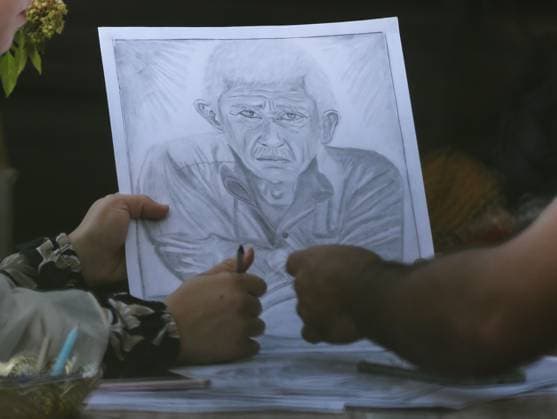 August 10, 2026, Gaza City, Palestine, State of: GAZA Gaza City, GAZA STRIP Ã¢â‚¬ AUGUST 9, 2026: Palestinian artist Nadia Abu Issa creates charcoal drawings depicting the hardships experienced by civilians during the war in Gaza, including shortages of food and water and life under continued displacement and insecurity. Living near an area affected by ongoing military activity, Abu Issa says her artwork aims to document the daily realities faced by Palestinians and preserve their experiences through art. Among her recent works is a portrait of Turkish President Recep Tayyip ErdoÄÅ¸an, which she says she created as a gesture of appreciation for TurkeyÃ¢â‚¬â ¢s support for Palestinians. Gaza City Palestine, State of - ZUMAq101 20260810_zna_q101_009 Copyright: xRamzixAbuxAmerx