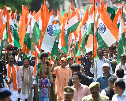 LUCKNOW, INDIA - AUGUST 9: Uttar Pradesh Chief Minister Yogi Adityanath along with deputy CM Keshav Prasad Maurya and deputy CM Brajesh Pathak and BJP state President Pankaj Chaudhary waves national flag during Tiranga Yatra under the Har Ghar Tiranga campaign ahead of the 80th Independence Day on August 9, 2026 in Lucknow, India. (Photo by Deepak Gupta Hindustan Times) UP CM Yogi Adityanath Leads Tiranga Yatra Under Har Ghar Tiranga Campaign Ahead Independence Day