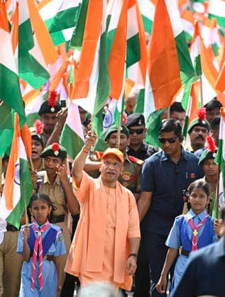 LUCKNOW, INDIA - AUGUST 9: Uttar Pradesh Chief Minister Yogi Adityanath waves national flag during Tiranga Yatra under the Har Ghar Tiranga campaign ahead of the 80th Independence Day on August 9, 2026 in Lucknow, India. (Photo by Deepak Gupta Hindustan Times) UP CM Yogi Adityanath Leads Tiranga Yatra Under Har Ghar Tiranga Campaign Ahead Independence Day