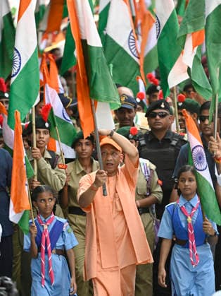 LUCKNOW, INDIA - AUGUST 9: Uttar Pradesh Chief Minister Yogi Adityanath waves national flag during Tiranga Yatra under the Har Ghar Tiranga campaign ahead of the 80th Independence Day on August 9, 2026 in Lucknow, India. (Photo by Deepak Gupta Hindustan Times) UP CM Yogi Adityanath Leads Tiranga Yatra Under Har Ghar Tiranga Campaign Ahead Independence Day