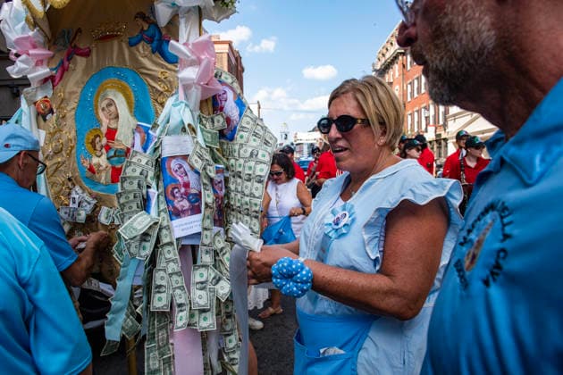 August 9, 2026, Boston, Massachusetts, USA: Patrons collect donations during the Feast of the Madonna Della Cava in the North End of Boston, Massachusetts on August 9, 2026. Boston USA  - ZUMAp158 20260809_aap_p158_002 Copyright: xJosephxPreziosox