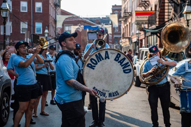 August 9, 2026, Boston, Massachusetts, USA: Bands play as patrons carry the image of the Madonna Della Cava during the Feast of the Madonna Della Cava in the North End of Boston, Massachusetts on August 9, 2026. Boston USA - ZUMAp158 20260809_aap_p158_026 Copyright: xJosephxPreziosox