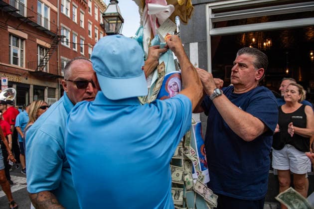 August 9, 2026, Boston, Massachusetts, USA: People pin money to the saintÃ¢â‚¬â ¢s image during the Feast of the Madonna Della Cava in the North End of Boston, Massachusetts on August 9, 2026. Boston USA - ZUMAp158 20260809_aap_p158_031 Copyright: xJosephxPreziosox