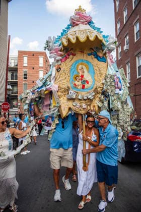 August 9, 2026, Boston, Massachusetts, USA: Patrons carry the image of the Madonna Della Cava during the Feast of the Madonna Della Cava in the North End of Boston, Massachusetts on August 9, 2026. Boston USA - ZUMAp158 20260809_aap_p158_035 Copyright: xJosephxPreziosox