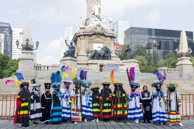 Indigenous Cultures Parade Through Mexico City MEXICO CITY, MEXICO AUGUST 9, 2026: Participants wearing traditional clothing dance and march during the 17th Mega Calenda cultural parade from the Angel of Independence to the Zocalo in Mexico City, August 9, 2026. Organized by the Mexico City government, the event commemorates the International Day of the World s Indigenous Peoples and is part of the 12th Festival of Indigenous Cultures, Indigenous Peoples, and Native Neighborhoods of Mexico City. Mexico City Mexico Copyright: x xCristianxLeyvax xJNAxPressx