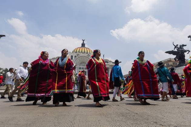 Indigenous Cultures Parade Through Mexico City MEXICO CITY, MEXICO AUGUST 9, 2026: Participants wearing traditional clothing dance and march during the 17th Mega Calenda cultural parade from the Angel of Independence to the Zocalo in Mexico City, August 9, 2026. Organized by the Mexico City government, the event commemorates the International Day of the World s Indigenous Peoples and is part of the 12th Festival of Indigenous Cultures, Indigenous Peoples, and Native Neighborhoods of Mexico City. Mexico City Mexico Copyright: x xCristianxLeyvax xJNAxPressx