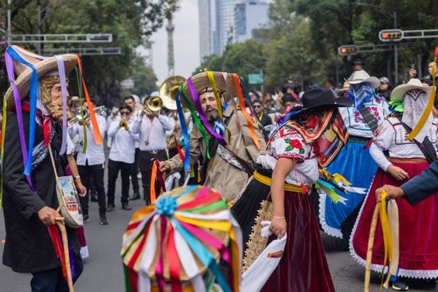 Indigenous Cultures Parade Through Mexico City MEXICO CITY, MEXICO AUGUST 9, 2026: Participants wearing traditional clothing dance and march during the 17th Mega Calenda cultural parade from the Angel of Independence to the Zocalo in Mexico City, August 9, 2026. Organized by the Mexico City government, the event commemorates the International Day of the World s Indigenous Peoples and is part of the 12th Festival of Indigenous Cultures, Indigenous Peoples, and Native Neighborhoods of Mexico City. Mexico City Mexico Copyright: x xCristianxLeyvax xJNAxPressx