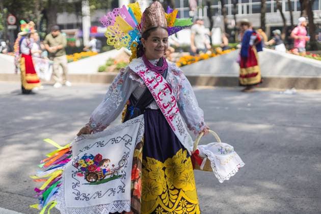 Indigenous Cultures Parade Through Mexico City MEXICO CITY, MEXICO AUGUST 9, 2026: Participants wearing traditional clothing dance and march during the 17th Mega Calenda cultural parade from the Angel of Independence to the Zocalo in Mexico City, August 9, 2026. Organized by the Mexico City government, the event commemorates the International Day of the World s Indigenous Peoples and is part of the 12th Festival of Indigenous Cultures, Indigenous Peoples, and Native Neighborhoods of Mexico City. Mexico City Mexico Copyright: x xCristianxLeyvax xJNAxPressx