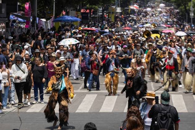 August 9, 2026, Mexico City, Mexico: MEXICO Mexico City, MEXICO Ã¢â‚¬ AUGUST 9, 2026: Participants wearing traditional clothing dance and march during the 17th Mega Calenda cultural parade from the Angel of Independence to the Zocalo in Mexico City, August 9, 2026. Organized by the Mexico City government, the event commemorates the International Day of the World s Indigenous Peoples and is part of the 12th Festival of Indigenous Cultures, Indigenous Peoples, and Native Neighborhoods of Mexico City. Mexico City Mexico  - ZUMAq101 20260809_zna_q101_161 Copyright: xCristianxLeyvax