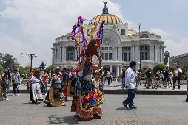 August 9, 2026, Mexico City, Mexico: MEXICO Mexico City, MEXICO Ã¢â‚¬ AUGUST 9, 2026: Participants wearing traditional clothing dance and march during the 17th Mega Calenda cultural parade from the Angel of Independence to the Zocalo in Mexico City, August 9, 2026. Organized by the Mexico City government, the event commemorates the International Day of the World s Indigenous Peoples and is part of the 12th Festival of Indigenous Cultures, Indigenous Peoples, and Native Neighborhoods of Mexico City. Mexico City Mexico  - ZUMAq101 20260809_zna_q101_162 Copyright: xCristianxLeyvax