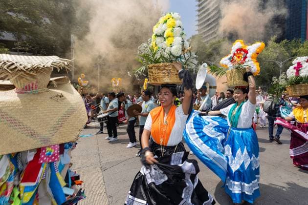 August 9, 2026, Mexico City, Mexico: MEXICO Mexico City, MEXICO Ã¢â‚¬ AUGUST 9, 2026: Participants wearing traditional clothing dance and march during the 17th Mega Calenda cultural parade from the Angel of Independence to the Zocalo in Mexico City, August 9, 2026. Organized by the Mexico City government, the event commemorates the International Day of the World s Indigenous Peoples and is part of the 12th Festival of Indigenous Cultures, Indigenous Peoples, and Native Neighborhoods of Mexico City. Mexico City Mexico - ZUMAq101 20260809_zna_q101_174 Copyright: xCristianxLeyvax