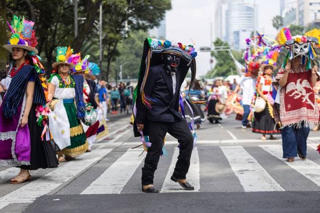 August 9, 2026, Mexico City, Mexico: MEXICO Mexico City, MEXICO Ã¢â‚¬ AUGUST 9, 2026: Participants wearing traditional clothing dance and march during the 17th Mega Calenda cultural parade from the Angel of Independence to the Zocalo in Mexico City, August 9, 2026. Organized by the Mexico City government, the event commemorates the International Day of the World s Indigenous Peoples and is part of the 12th Festival of Indigenous Cultures, Indigenous Peoples, and Native Neighborhoods of Mexico City. Mexico City Mexico - ZUMAq101 20260809_zna_q101_173 Copyright: xCristianxLeyvax