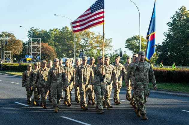 August 9, 2026, Warsaw, Mazovia, Poland: American soldiers march during the parade rehearsal. Early in the morning of 9th August, Poland s armed forces, and those of allies stationed in the country, take part in a rehearsal in preparation for a parade on National Armed Forces Day on the 15th August. Soldiers muster as the sun rises over the Vistula River and march past grandstands prepared for dignitaries. The soldiers were followed by mechanised divisions travelling in tanks and a variety of armoured vehicles. Afterwards, Secretary of State in the Ministry of Defence, Pawel Bejda addresses a post-rehearsal press conference, where he is accompanied by the Chief of the General Staff of the Polish Armed Forces, General Wieslaw Kukula. Warsaw  - ZUMAs197 20260809_aaa_s197_069 Copyright: xNeilxMiltonx