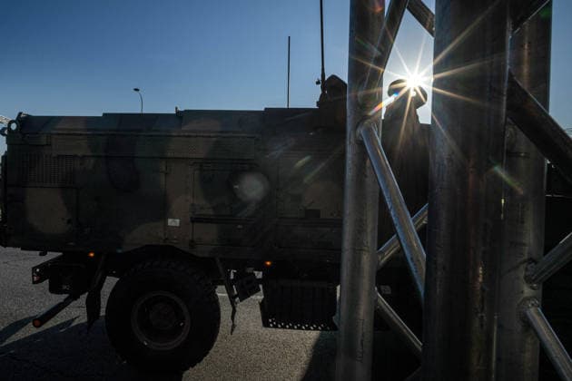 August 9, 2026, Warsaw, Mazovia, Poland: A soldier atop an armoured vehicle salutes while backlit by the rising sun. Early in the morning of 9th August, Poland s armed forces, and those of allies stationed in the country, take part in a rehearsal in preparation for a parade on National Armed Forces Day on the 15th August. Soldiers muster as the sun rises over the Vistula River and march past grandstands prepared for dignitaries. The soldiers were followed by mechanised divisions travelling in tanks and a variety of armoured vehicles. Afterwards, Secretary of State in the Ministry of Defence, Pawel Bejda addresses a post-rehearsal press conference, where he is accompanied by the Chief of the General Staff of the Polish Armed Forces, General - ZUMAs197 20260809_aaa_s197_071 Copyright: xNeilxMiltonx