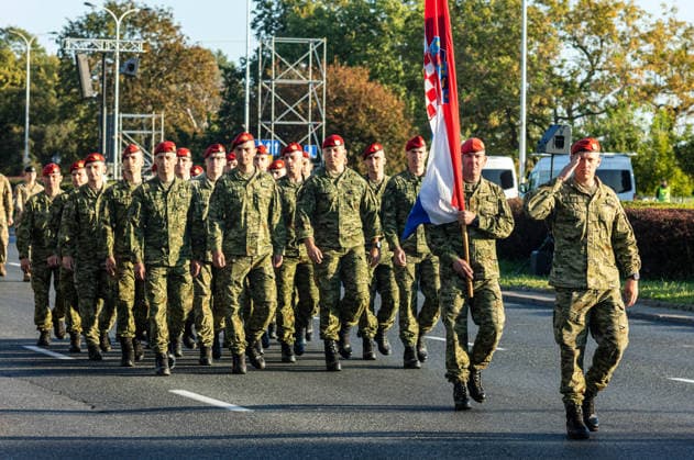 August 9, 2026, Warsaw, Mazovia, Poland: Croatian soldiers march during the parade rehearsal. Early in the morning of 9th August, Poland s armed forces, and those of allies stationed in the country, take part in a rehearsal in preparation for a parade on National Armed Forces Day on the 15th August. Soldiers muster as the sun rises over the Vistula River and march past grandstands prepared for dignitaries. The soldiers were followed by mechanised divisions travelling in tanks and a variety of armoured vehicles. Afterwards, Secretary of State in the Ministry of Defence, Pawel Bejda addresses a post-rehearsal press conference, where he is accompanied by the Chief of the General Staff of the Polish Armed Forces, General Wieslaw Kukula. Warsaw - ZUMAs197 20260809_aaa_s197_074 Copyright: xNeilxMiltonx