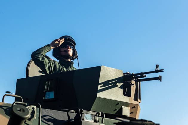 August 9, 2026, Warsaw, Mazovia, Poland: A soldier atop an armoured vehicle salutes during the parade rehearsal. Early in the morning of 9th August, Poland s armed forces, and those of allies stationed in the country, take part in a rehearsal in preparation for a parade on National Armed Forces Day on the 15th August. Soldiers muster as the sun rises over the Vistula River and march past grandstands prepared for dignitaries. The soldiers were followed by mechanised divisions travelling in tanks and a variety of armoured vehicles. Afterwards, Secretary of State in the Ministry of Defence, Pawel Bejda addresses a post-rehearsal press conference, where he is accompanied by the Chief of the General Staff of the Polish Armed Forces, General Wies  - ZUMAs197 20260809_aaa_s197_088 Copyright: xNeilxMiltonx