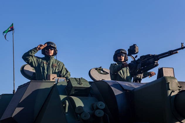 August 9, 2026, Warsaw, Mazovia, Poland: A soldier atop an armoured vehicle salutes during the parade rehearsal. Early in the morning of 9th August, Poland s armed forces, and those of allies stationed in the country, take part in a rehearsal in preparation for a parade on National Armed Forces Day on the 15th August. Soldiers muster as the sun rises over the Vistula River and march past grandstands prepared for dignitaries. The soldiers were followed by mechanised divisions travelling in tanks and a variety of armoured vehicles. Afterwards, Secretary of State in the Ministry of Defence, Pawel Bejda addresses a post-rehearsal press conference, where he is accompanied by the Chief of the General Staff of the Polish Armed Forces, General Wies  - ZUMAs197 20260809_aaa_s197_091 Copyright: xNeilxMiltonx