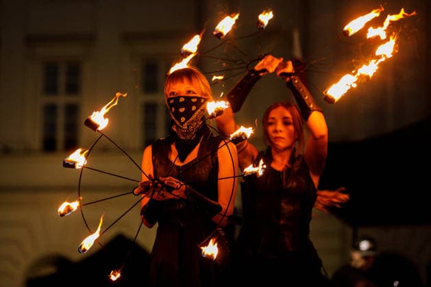 August 9, 2026, Warsaw, Poland: A flare is seen near the Nicolaus Copernicus Monument during an evening rally marking the sixth anniversary of the August 2020 presidential election in Belarus. An evening gathering marking the sixth anniversary of the August 2020 presidential election in Belarus was held near the Nicolaus Copernicus Monument in central Warsaw, bringing together leaders of Belarusian democratic forces, public figures and activists, as well as several hundred participants. Warsaw Poland  - ZUMAs197 20260809_aaa_s197_110 Copyright: xVolhaxShukailax