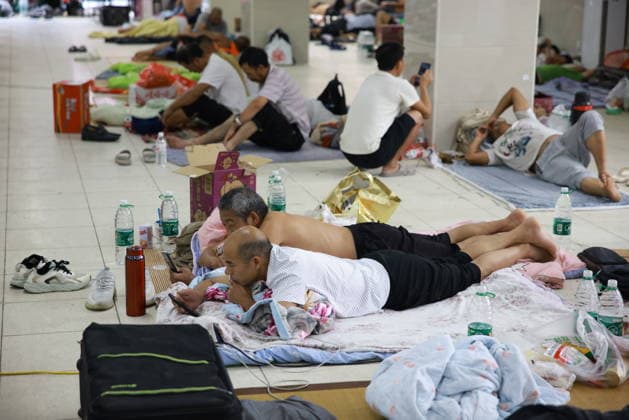 YUEQING, CHINA - AUGUST 09: Residents stay at a temporary relief shelter set up at Chengnan Middle School on August 9, 2026 in Yueqing, Wenzhou City, Zhejiang Province of China. China s national observatory on August 9 activated a red alert -- the highest level in the country s typhoon warning system -- as Typhoon Dolphin approaches.  Copyright: xChinaxNewsxServicex 111658969115