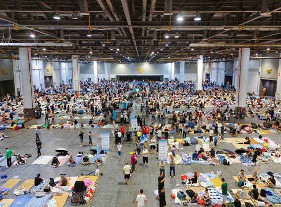 HANGZHOU, CHINA - AUGUST 09: A temporary shelter is set up for workers at Qianjiang Century City on August 9, 2026 in Hangzhou, Zhejiang Province of China. Nearly 10,000 workers were safely evacuated from the area as Typhoon Dolphin approaches.  Copyright: xVCGx 111658990987